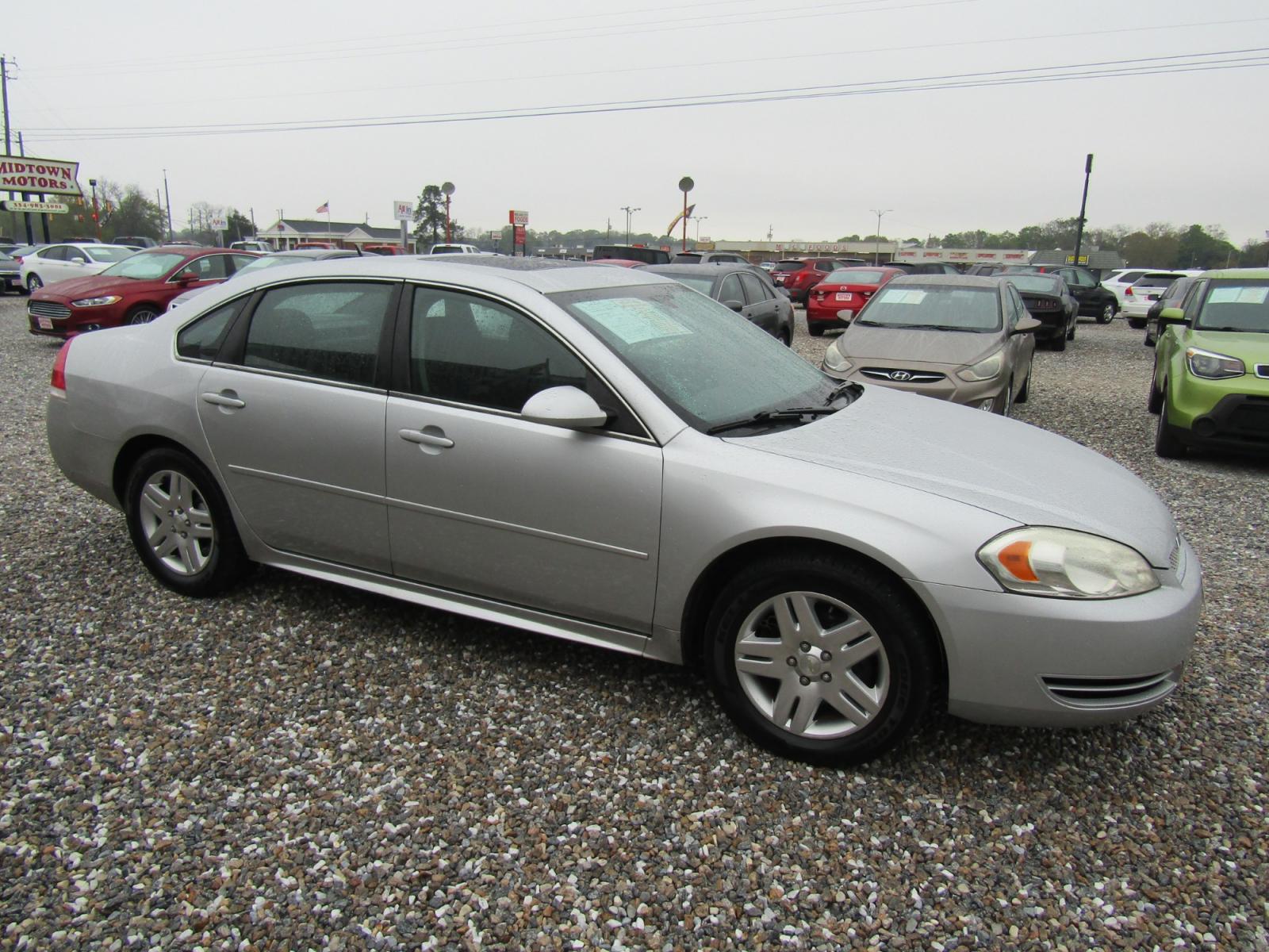 2014 Silver Chevrolet Impala LT (2G1WB5E30E1) with an 3.6L V6 DOHC 16V FFV engine, Automatic transmission, located at 15016 S Hwy 231, Midland City, AL, 36350, (334) 983-3001, 31.306210, -85.495277 - Photo #0